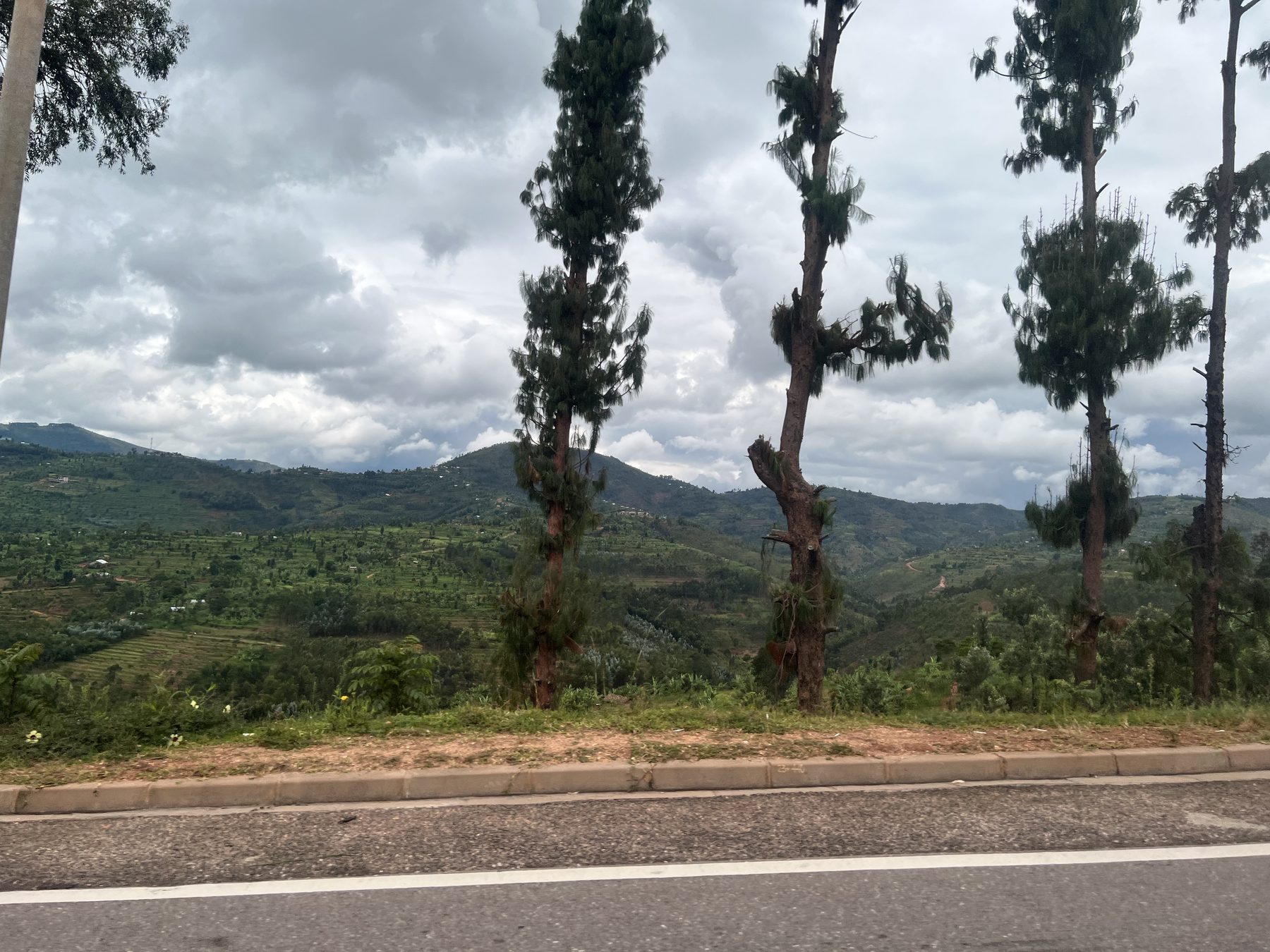 Terraced hills and mountain road in the Rwandan countryside